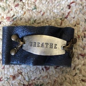 Genuine leather bracelet with charm.